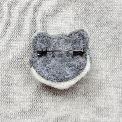 Брошь из войлока "Енот". - 2